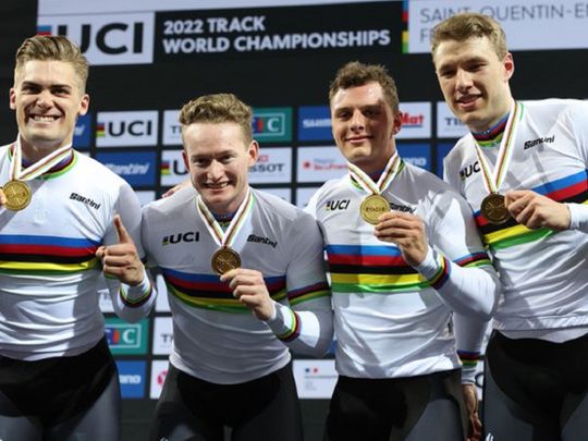 Matthew Richardson, Matthew Glaetzer, Leigh Hoffman and Thomas Cornish show their medals after a golden effort to take the men's team sprint world title at #SQY2022.