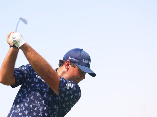 Patrick Reed tunes up on the Royal Greens driving range-1665679349085