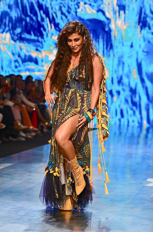 Bollywood actress Chitrangda Singh presents a creation by designer Eshaa Amin during the FDCI X Lakme Fashion Week in Mumbai on October 14, 2022