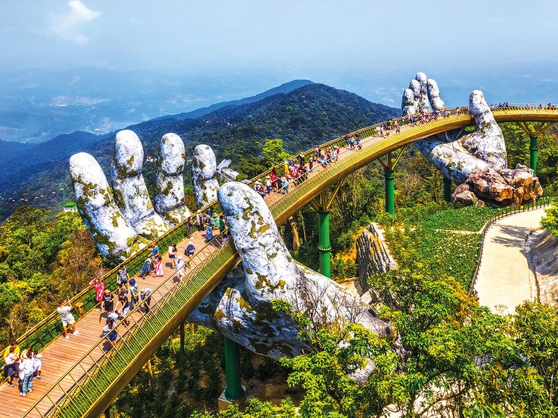 One of the most iconic structures in Vietnam is the Golden Bridge at Bana Hills