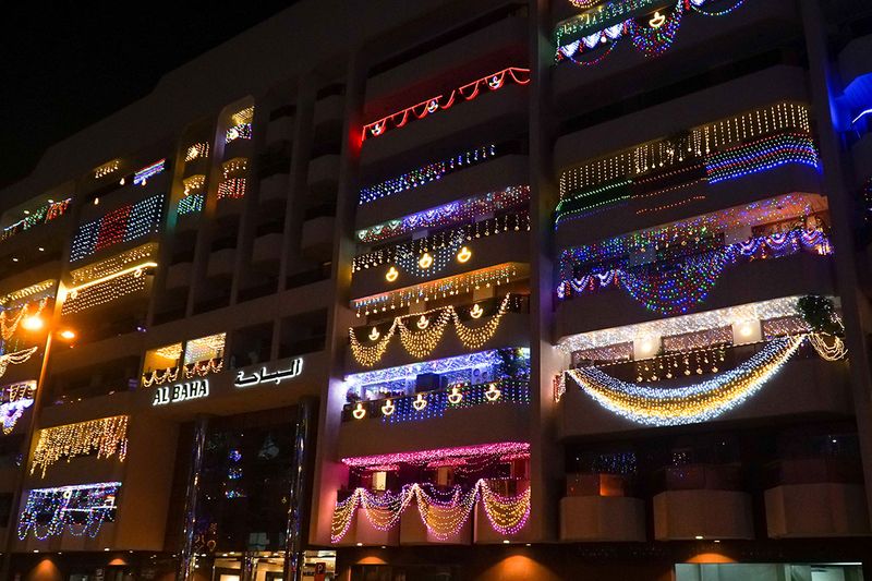 Buildings lit up with colourful decorative lights for Diwali celebrations in Bur Dubai. 