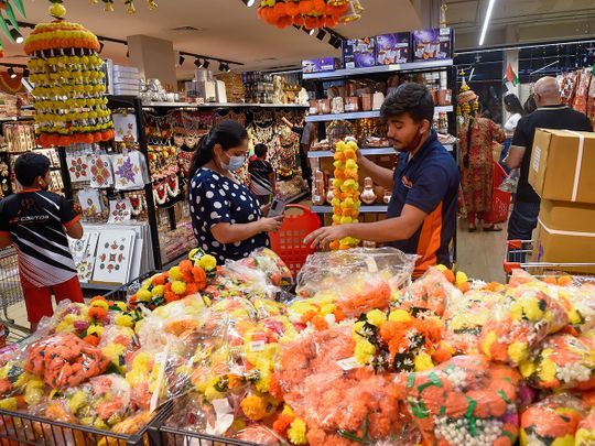 Residents shopping for Diwali celebrations at Madhoor supermarket in Karama.