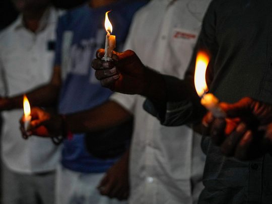 Photos: Families line up to bury dead from India bridge collapse | News ...