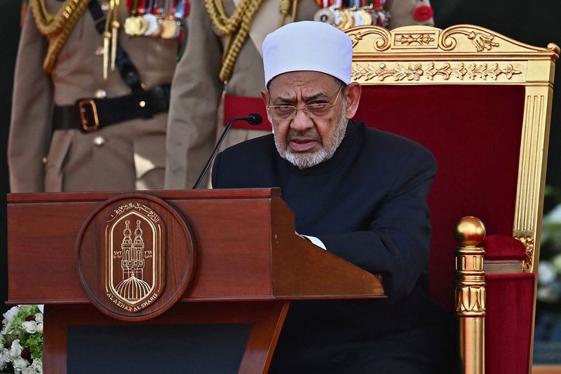Grand Imam of al-Azhar mosque Sheikh Ahmed Al-Tayeb delivers a speech during a ceremony alongside Bahrain's King Hamad bin Isa al-Khalifa and Pope at Sakhir Royal Palace, in Bahrain. 