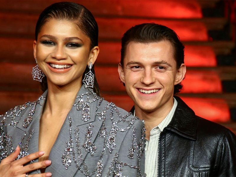 Tom Holland, right, and Zendaya pose for photographers at the photo call for the film 'Spider-Man: No Way Home' in London Sunday, Dec. 5, 2021
