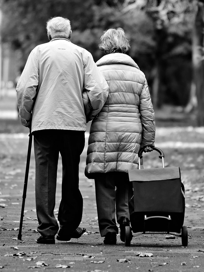 An old couple going for a walk 
