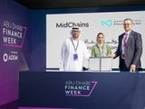 Al Maryah Community Bank and MidChains sign partnership