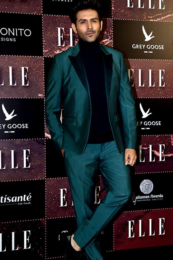 Bollywood actor Kartik Aaryan poses for a picture at the 'ELLE Beauty Awards 2022', in Mumbai on Thursday. (ANI Photo)
