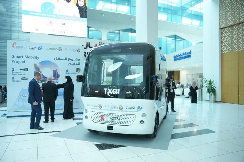 Visitors at the Mobility Education Summit robo buses one of Abu Dhabi's smart mobility solutions-1668772343549