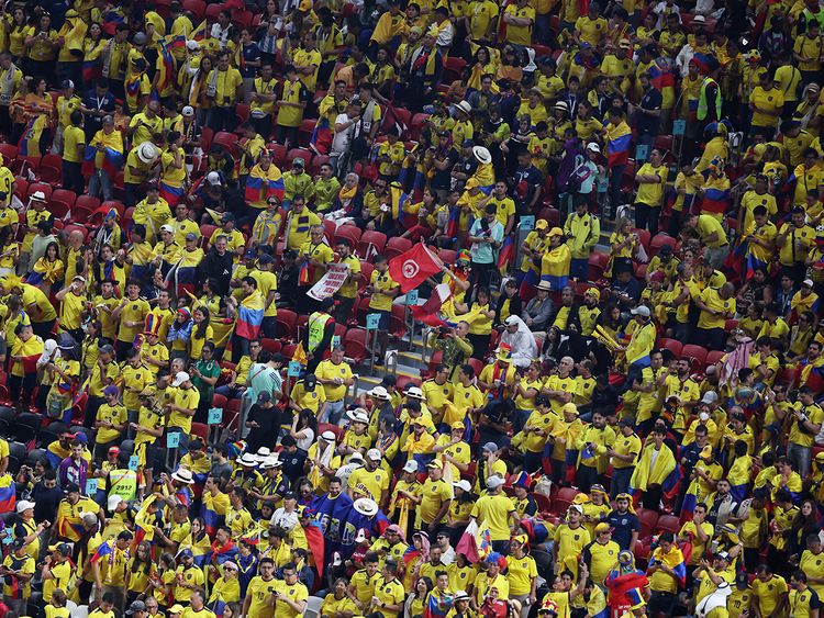 Fans of Ecuador's cheer ahead of the World Cup Group A football match between Qatar and Ecuador at the Al Bayt Stadium in Al Khor, north of Doha. 