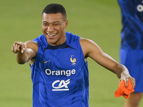 France's forward Kylian Mbappe reacts during a training session at the Jassim bin- Hamad Stadium in Doha. 