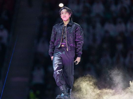 Musician Jung Kook of the K-Pop group BTS performs during the opening ceremony of the FIFA World Cup at Al Bayt Stadium in Al Khor, Qatar, on Sunday, Nov. 20, 2022. 