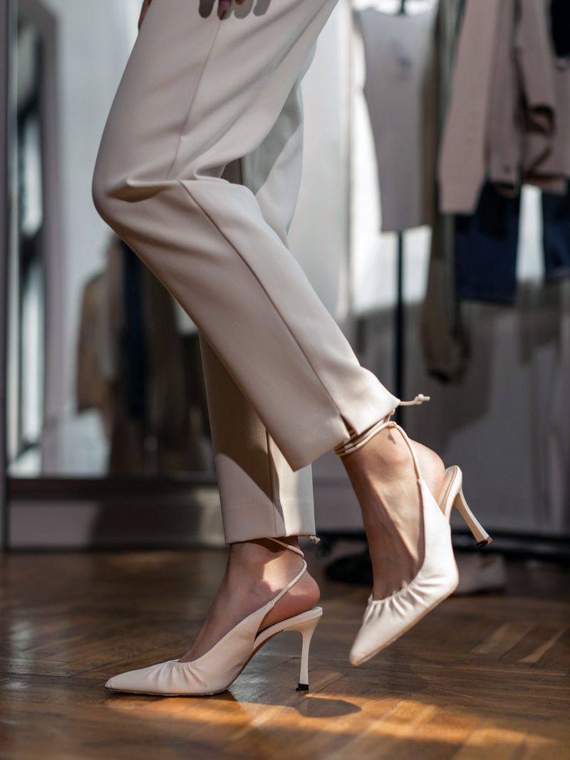woman wearing light coloured heels