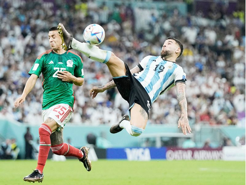 Argentina's Nicolas Otamendi controls the ball during the World Cup group C match against Mexico, at the Lusail Stadium in Lusail, Qatar, Saturday, November 26, 2022. 