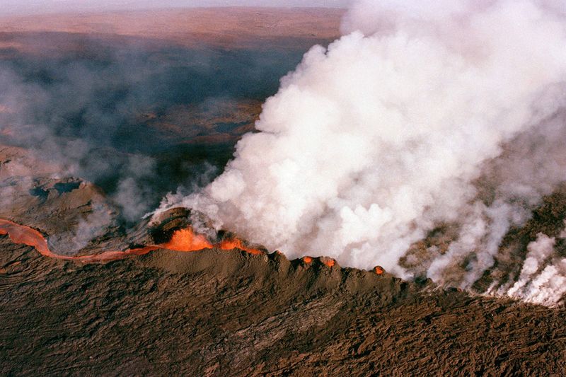  A gaseous cloud rises from the crater of Mauna Loa, center, on the big island of Hawaii, April 4, 1984. 