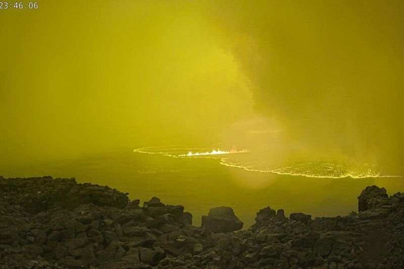 Lava is seen at Mauna LoaÕs summit region during an eruption as viewed by a remote camera of the U.S. Geological Survey in Hawaii, U.S. November 27, 2022. 