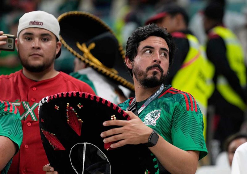 Mexico fans on the stands react at the end of the Qatar World Cup group C