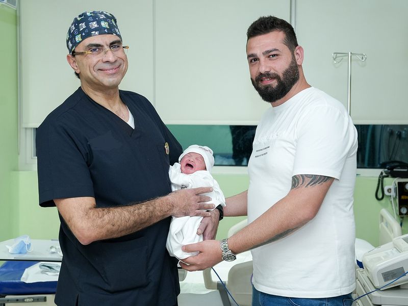 Dr._(Prof.)_Walid_El-Sherbiny,_Consultant,_Obstetrics_&_Gynecology_&_HOD_and_Mustafa_Angro,_with_Little_Ruganda_at_Medeor_Hospital,_Abu_Dhabi-1669962969794