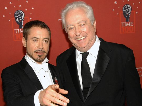 FILE - Actor Robert Downey Jr., left, and his father Robert Downey Sr. arrive at Time's 100 Most Influential People in the World Gala in New York on May 8, 2008. Downey Jr. pays tribute to his late iconoclastic father, a cult filmmaker who introduced his son to acting, in the Netflix documentary 