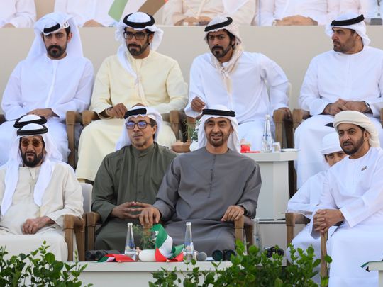 Front row: President His Highness Sheikh Mohamed bin Zayed Al Nahyan (3rd from left) along with Sheikh Tahnoon bin Mohamed Al Nahyan, Ruler's Representative in Al Ain Region (left), Sheikh Mansour bin Zayed Al Nahyan, UAE Deputy Prime Minister and Minister of the Presidential Court (2nd left), Sheikh Hamdan bin Zayed Al Nahyan, Ruler’s Representative in Al Dhafra Region (right), watch 'March of the Union', during the Sheikh Zayed Heritage Festival. 