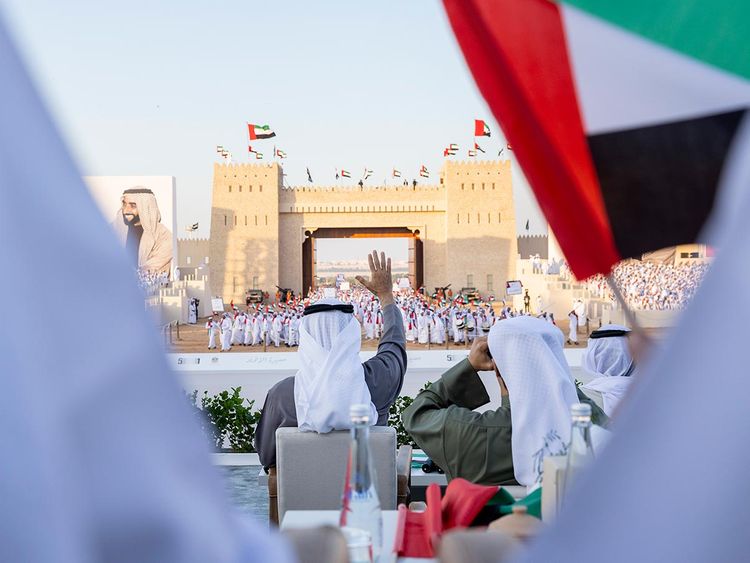 President Sheikh Mohamed bin Zayed Al Nahyan waves during the ‘March of the Union’ parade. 
