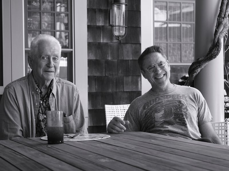 This image released by Netflix shows Robert Downey Sr., left, and his son Robert Downey Jr. from the documentary 