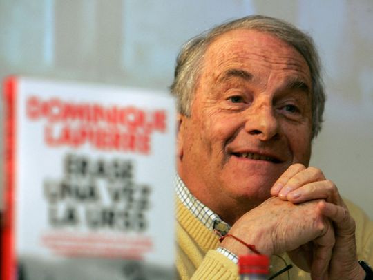 In this file photo taken on January 18, 2006 French author Dominique Lapierre speaks at a press conference to promote the Spanish translation of his book 'Once upon a time in the USSR' in Madrid. - French writer Dominique Lapierre, the author of best-selling books on India like 