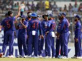 Indian players celebrate a wicket 
