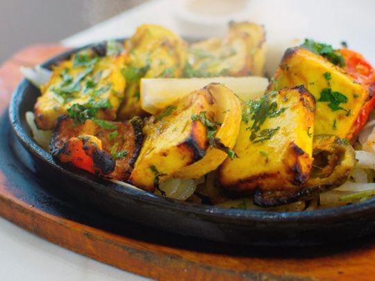 Smoky grilled Paneer on a platter