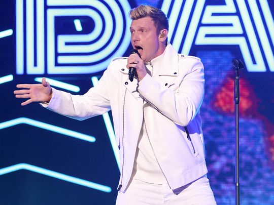 Nick Carter performs with Backstreet Boys during the iHeartRadio Jingle Ball concert