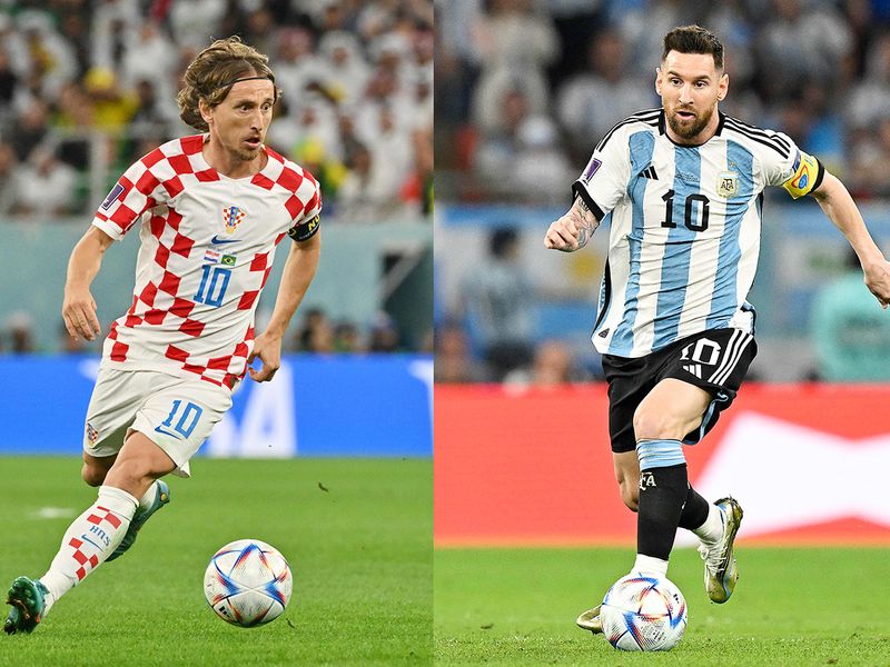 Croatia's midfielder Luka Modric (L) and Argentina's forward Lionel Messi. 