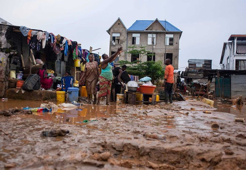 Residents clean up following torrential rains in Kinshasa, Democratic Republic of Congo