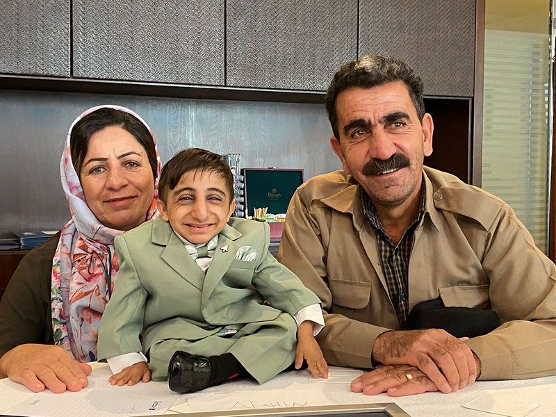 Afshin with his parents
