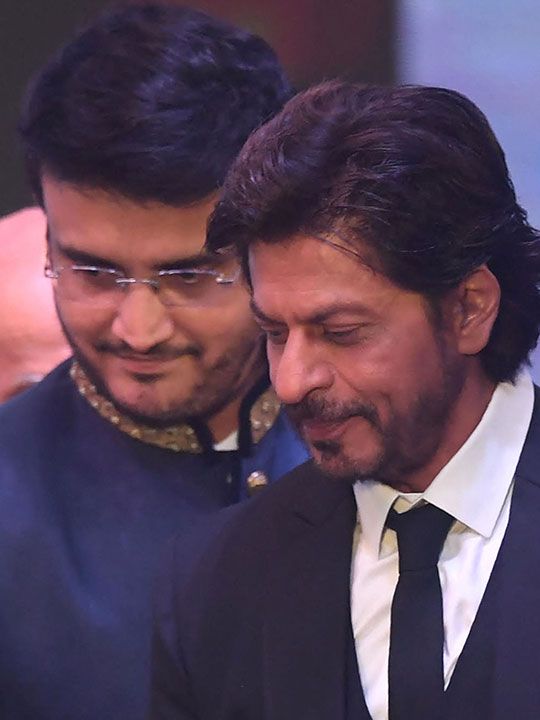 Shah Rukh Khan (R) attends the inauguration ceremony of 28th Kolkata International film festival in Kolkata on December 15, 2022.