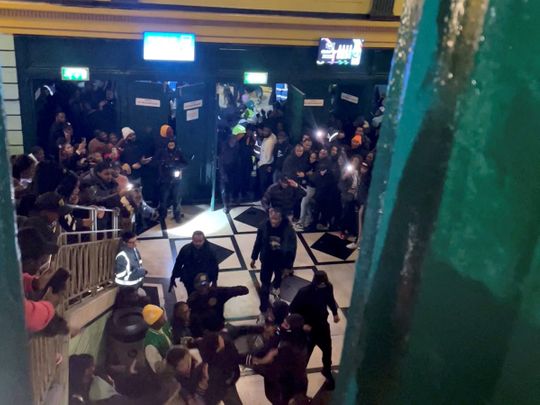 A view shows people fighting inside Brixton Academy after many of them attempted to force entry into the venue for a concert, according to a police statement, in Brixton, London, Britain December 15, 2022, in this still image obtained from a social media video.