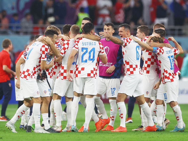 Croatia players celebrate after winning the Qatar World Cup third-place playoff 2-1 against Morocco at the Khalifa International Stadium, in Doha. 