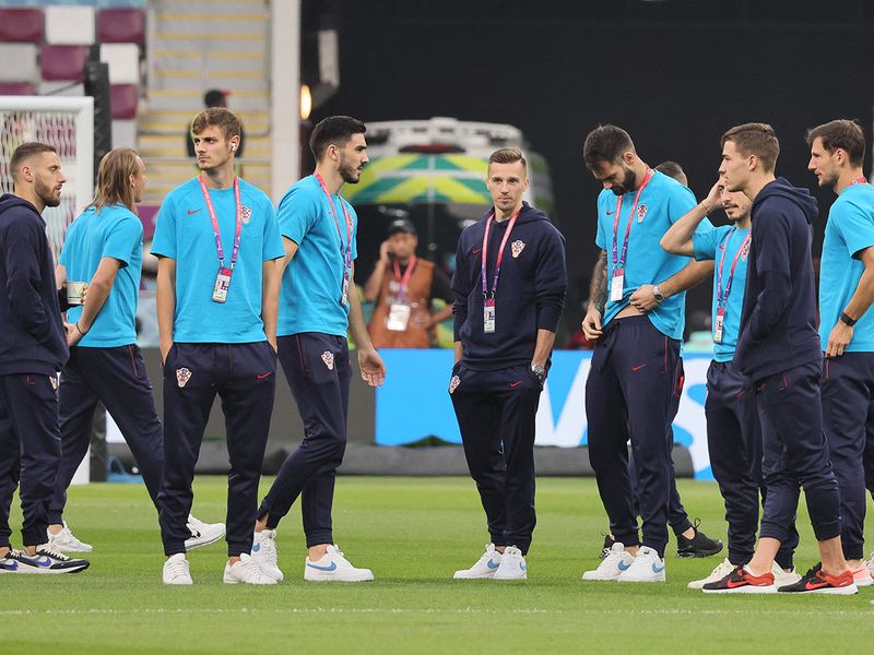 Croatia's players walk on the ground prior to the Qatar World Cup third place play-off match against Morocco at Khalifa International Stadium in Doha on December 17, 2022.  