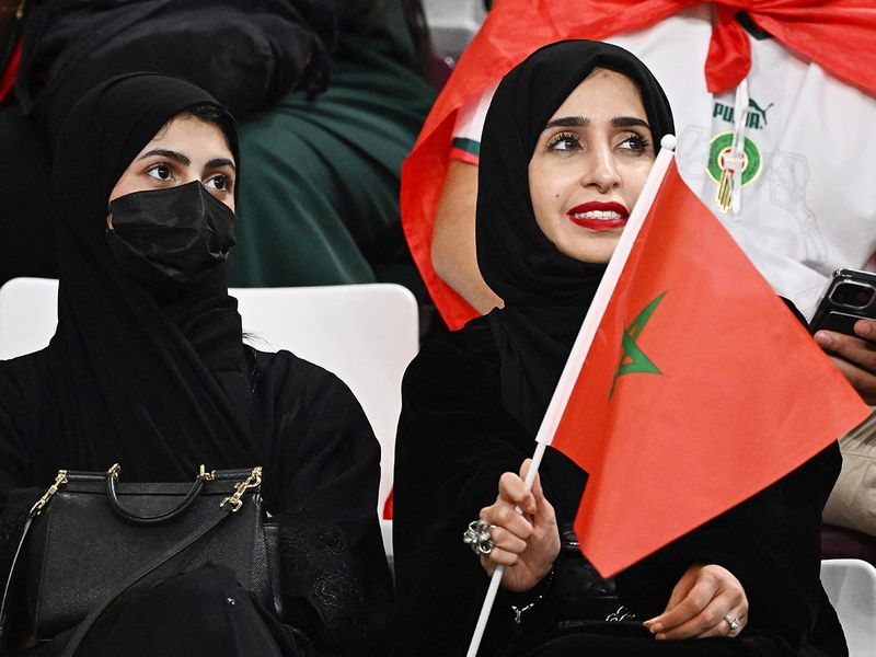 Morocco supporters sit in the tribunes prior to the match at Khalifa International Stadium in Doha. 