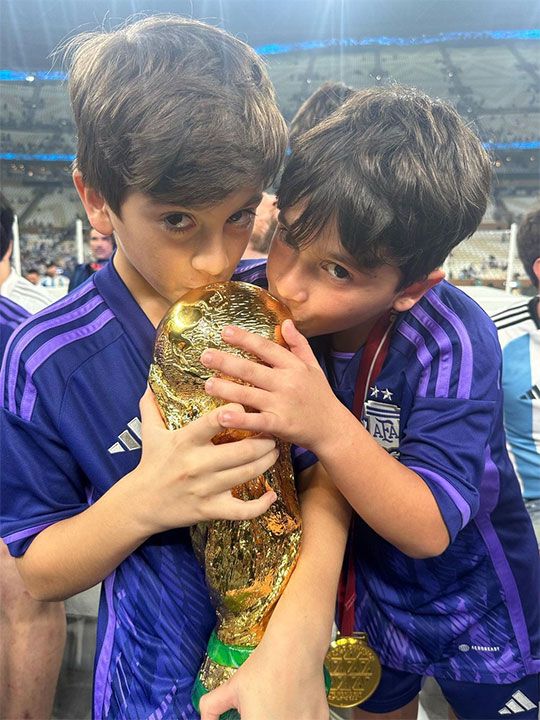  Lionel Messi  sons holds his Golden Ball award  after the awards ceremony after winning the Qatar 2022 World Cup football final match alty shoot-out.