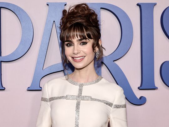 Lily Collins attends the 'Emily In Paris' red carpet at the French Consulate on December 15, 2022 in New York City.