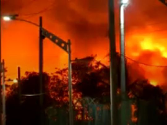 Fire erupts at a Barranquilla oil tank in Colombia.