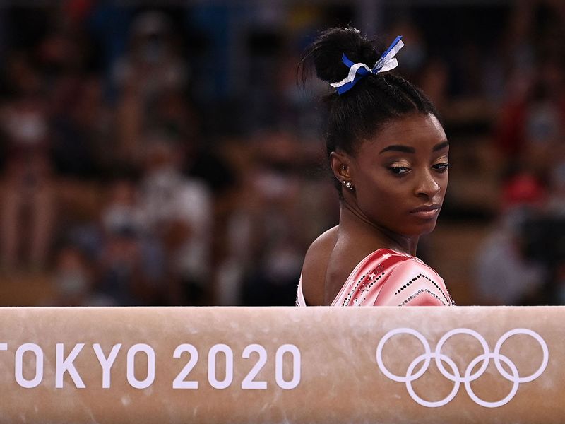 American gymnast Simone Biles during the Tokyo 2020 Olympics. She withdrew from four finals while battling mental issues, but overcame the 'twisties' to take bronze in balance beam