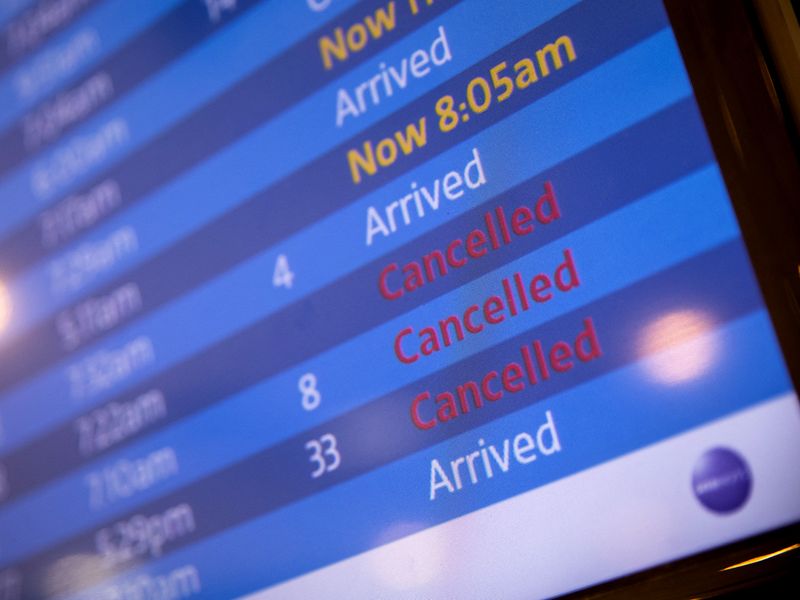 A screen showing cancelled flights is seen at John F. Kennedy International Airport in Queens, New York . 