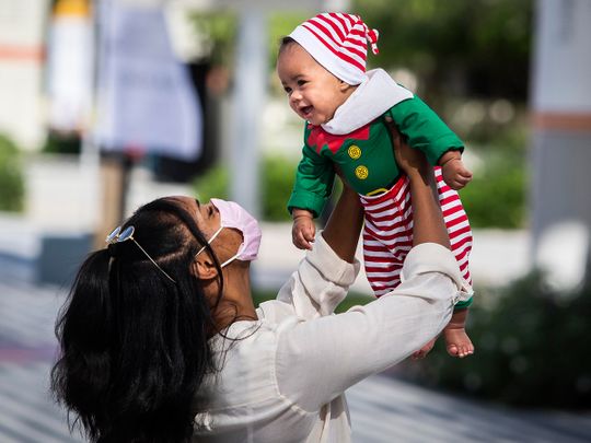 A_child_dressed_as_Santa’s_Helper_at_Opportunity_District_Large_Image_m25374-1640588772593