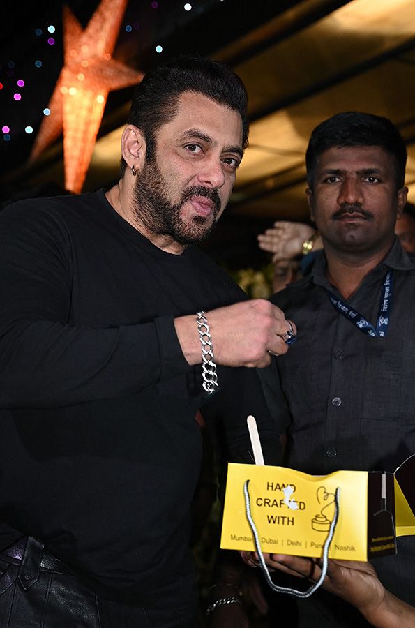 Bollywood actor Salman Khan cuts a cake during his birthday celebrations in Mumbai. 