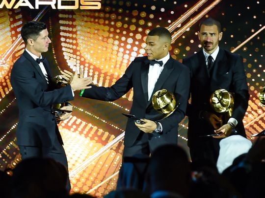 Robert Lewandowski and Kylian Mbappe at the Dubai Globe Soccer Awards