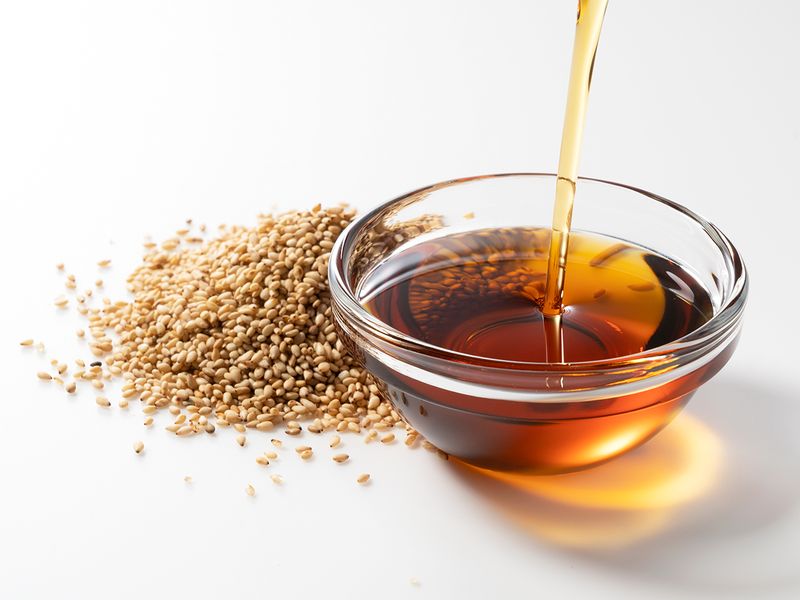 Sesame oil - a thick yellowish brown coloured oil 