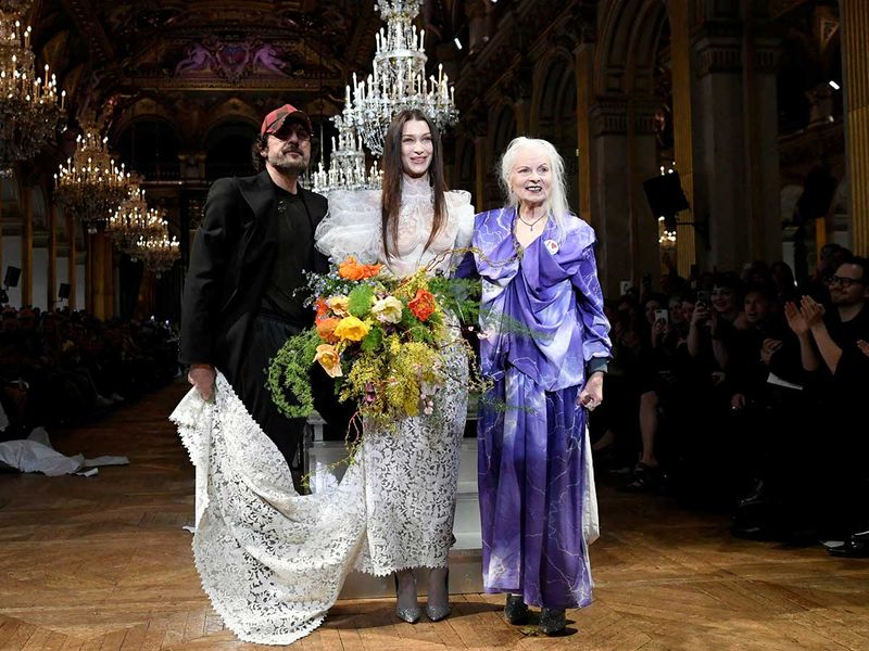  Designers Vivienne Westwood and Andreas Kronthaler pose with model Bella Hadid