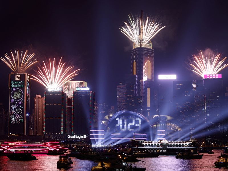 Fireworks explode over Victoria Harbour to celebrate the New Year in Hong Kong