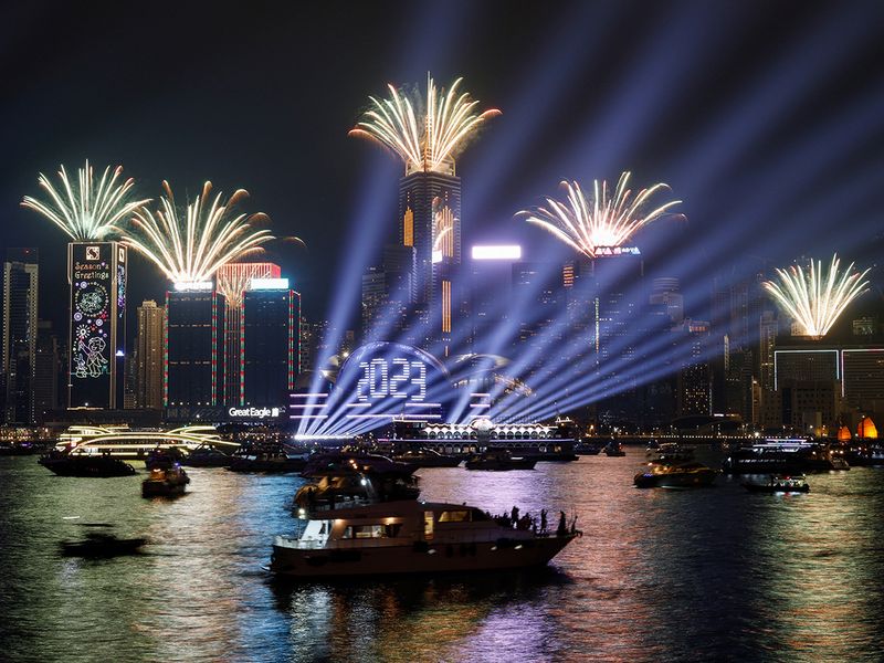 Fireworks explode over Victoria Harbour to celebrate the New Year in Hong Kong